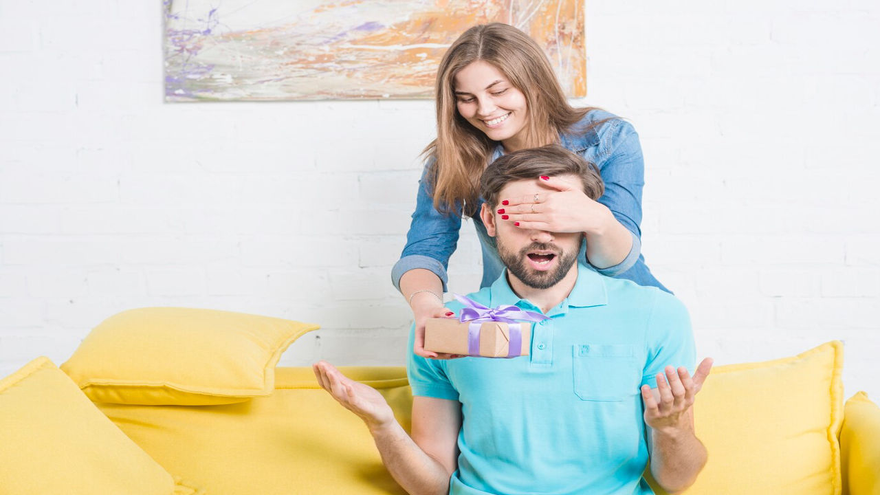 Husband Receiving Heartfelt Fathers Day Wishes Home a Wife Giving Her Husband a Thoughtful Fathers Day Wish and Card